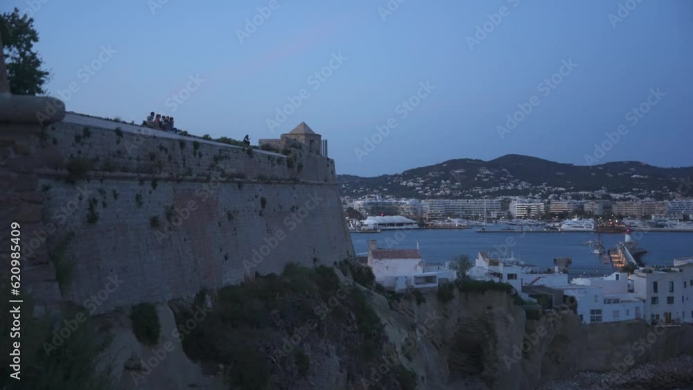 City walls, Dalt Vila district and harbour at dusk, UNESCO World Heritage Site, Ibiza Town, Ibiza, Balearic Islands, Spain City walls, Dalt Vila district and harbour at dusk, UNESCO World Heritage Site, Ibiza Town, Ibiza, Balearic Islands, Spain
