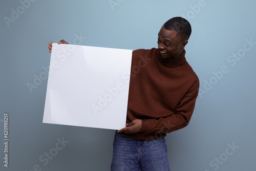 young african male student demonstrating his thesis using a whiteboard with mockup photo