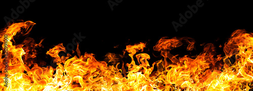 The  biggest fire flames of realistic burning on black background. For art work design, banner or backdrop.