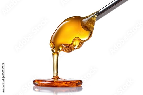notion of medical marijuana Dropper with CBD oil and cannabis live resin extraction in macro detail, isolated on white photo