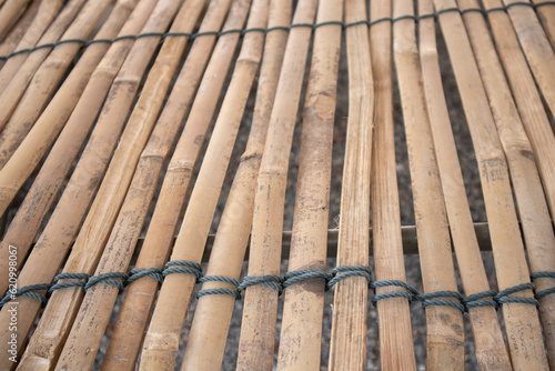 The bamboo was tied together with ropes for the walls.