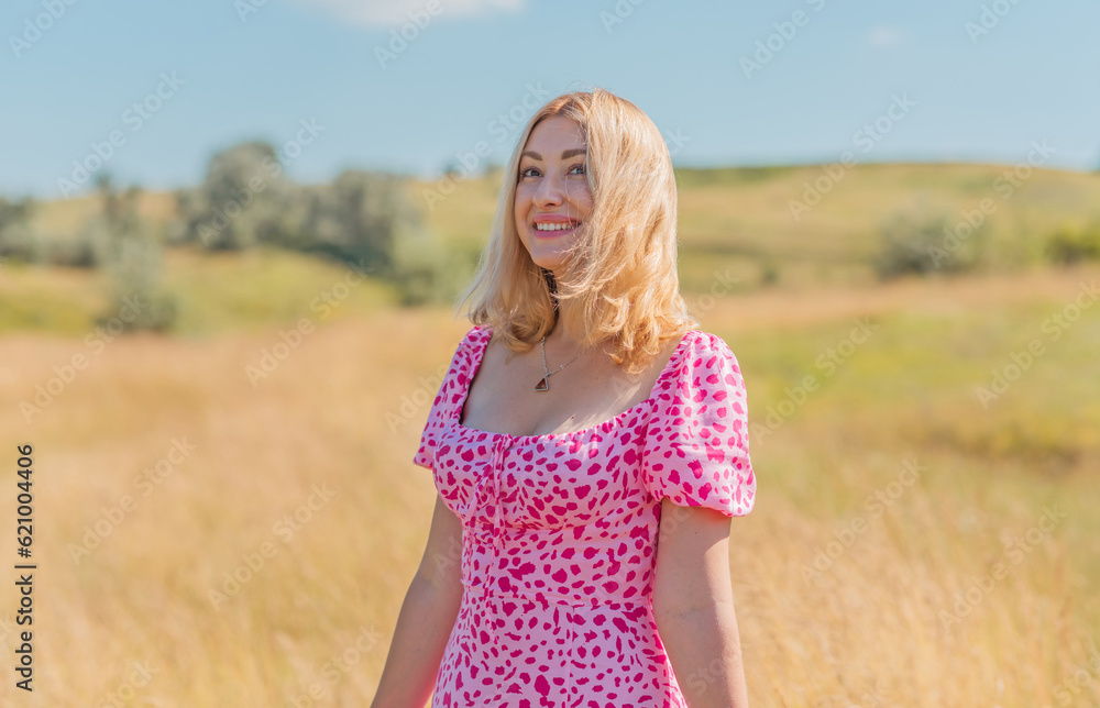 Romantic woman, natural women beauty. Lady at nature, pretty European lady in pink dress Romantic woman, natural women beauty. Lady at nature, pretty European lady in pink dress