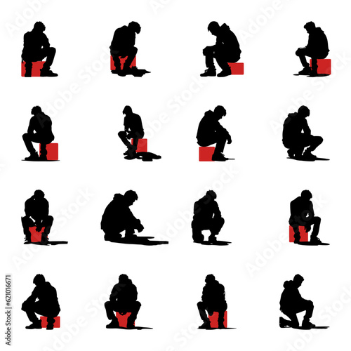 silhouette of sitting man looking down sad, depressed, regret