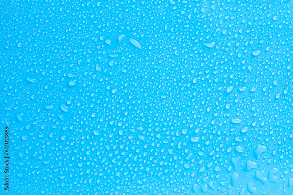 Blue background in water drops close up Stock Photo | Adobe Stock