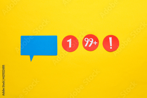 Fototapeta Naklejka Na Ścianę i Meble -  Speech bubble and Red round notification icons on yellow background. Social media