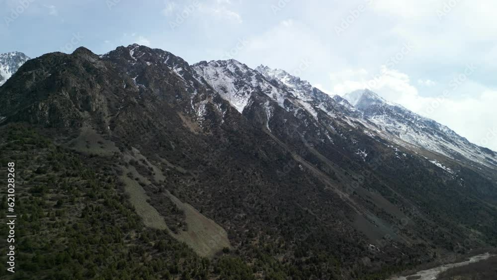 Alamedin Gorge, large mountains with snow Alamedin Gorge, large mountains with snow