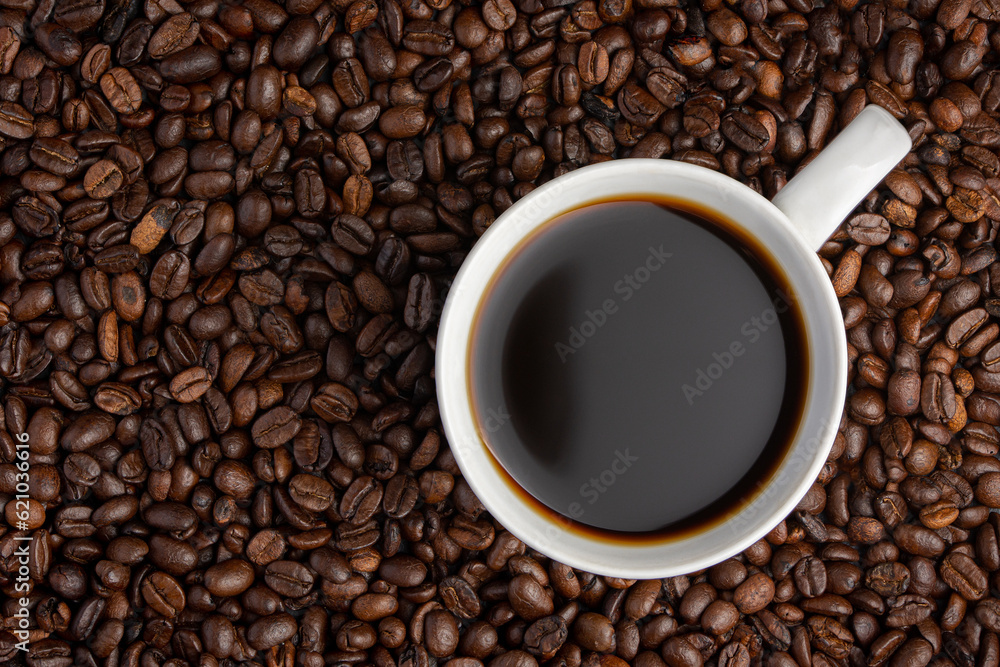 Coffee cup with coffee beans around. Top view. Background Coffee cup with coffee beans around. Top view. Background