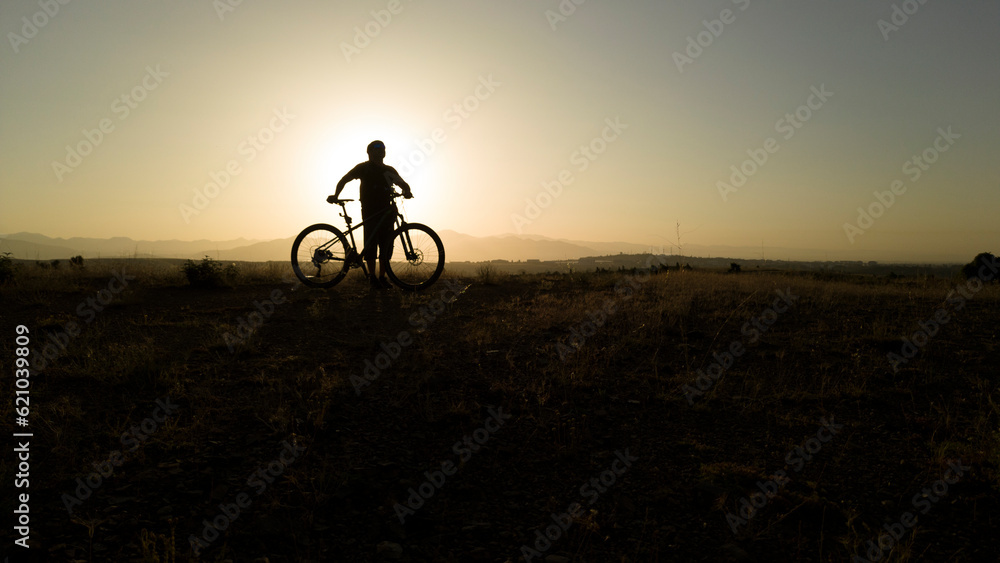 Radiant Rides: Biking in the Mountain Wilderness Under the Warm Sun Radiant Rides: Biking in the Mountain Wilderness Under the Warm Sun