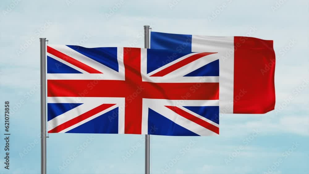United Kingdom, UK and France flags waving together on blue sky, looped video, two country cooperation concept United Kingdom, UK and France flags waving together on blue sky, looped video, two country cooperation concept