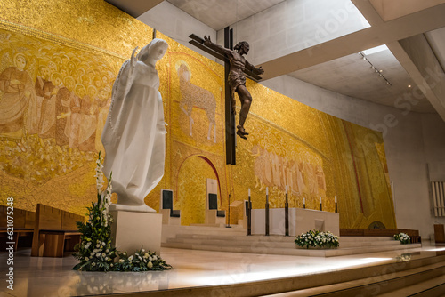 Altar with statue of Virgin Mary and crucified Jesus with religious and gilded panel, Fátima PORTUGAL