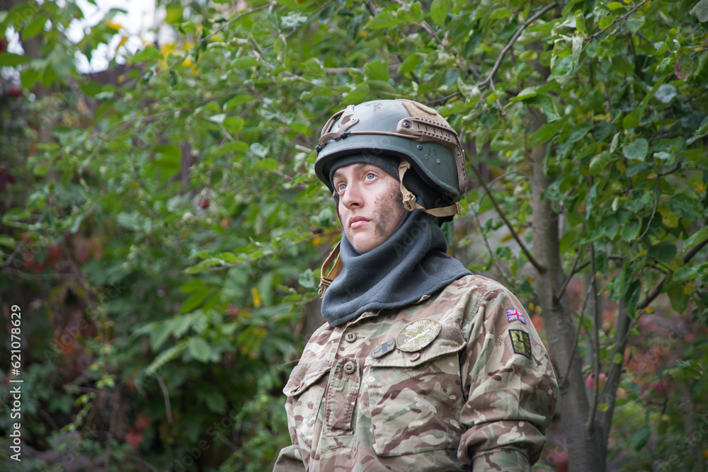 Sad woman soldier in uniform