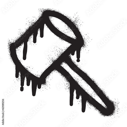 Hammer icon graffiti with black spray paint	