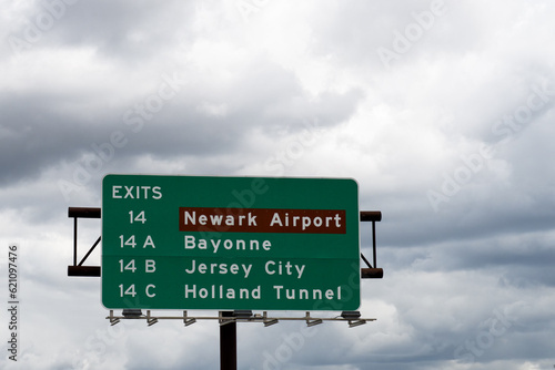 sign for Exit 14 on the New Jersey Turnpike I95 for Newark Airport and 14A Bayonne, 14B Jersey City and 14C Holland Tunnel photo
