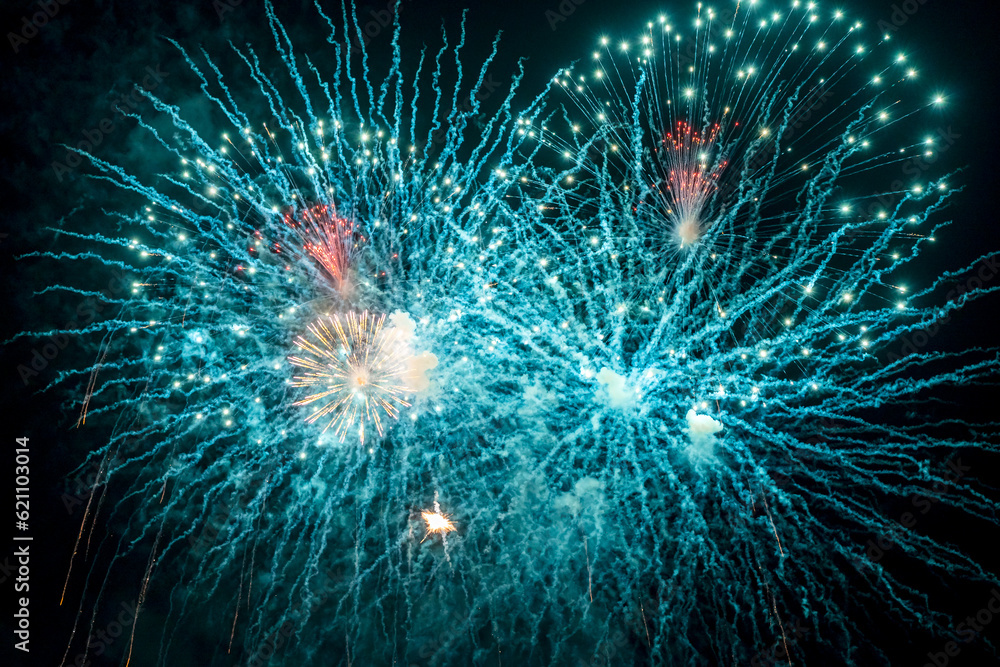 Beautiful blue firework at night. Selective focus. Beautiful blue firework at night. Selective focus.