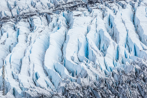 Huge Crevasses show blue ice deep in the Matanuska Glacier of Alaska.