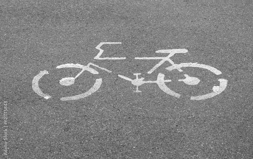 Bicycle sign on concrete street Bicycle sign on concrete street