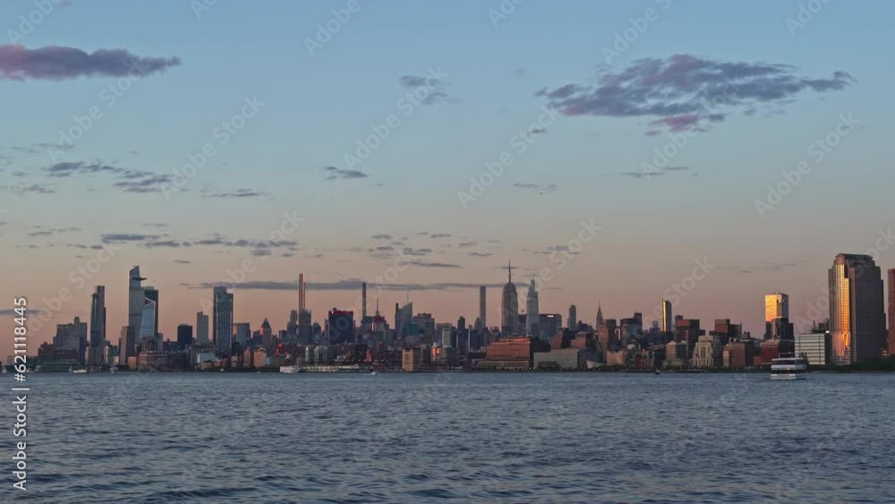 Impressive silhouette of New York skyscrapers, seen from New Jersey waterfront Impressive silhouette of New York skyscrapers, seen from New Jersey waterfront