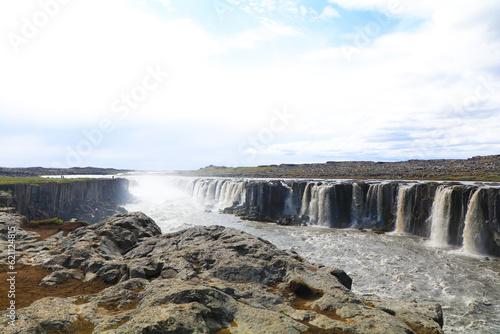 Selfoss, Iceland,  waterfall in the mountains photo