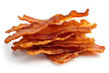 Crispy fried bacon strips, a salty and fatty American breakfast staple, isolated on a white background