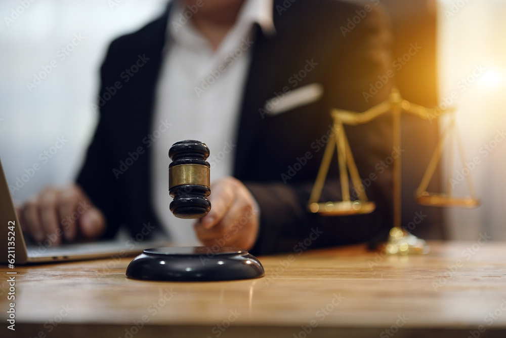 Judge gavel with Justice lawyers having team Concepts of Law and Legal services Judge gavel with Justice lawyers having team Concepts of Law and Legal services