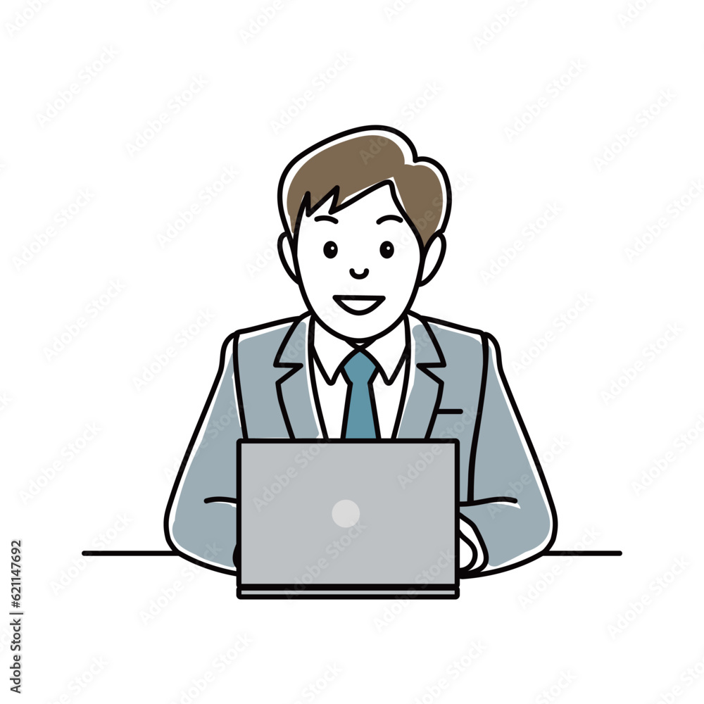 笑顔でパソコンを操作するスーツ男性