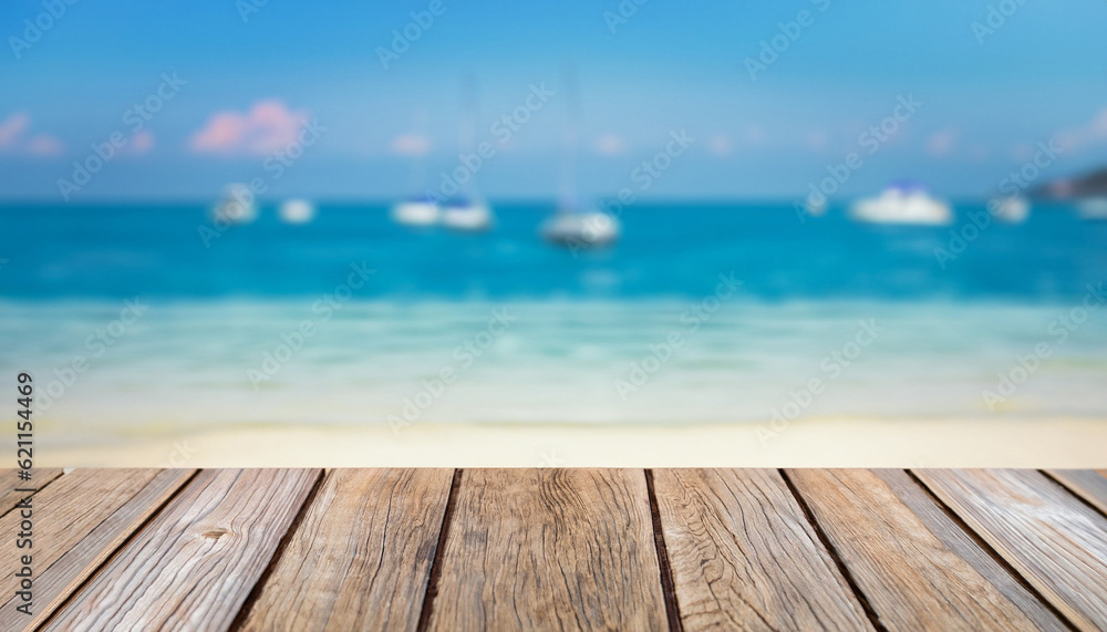 Blurred sea background with wood resort deck floor foreground