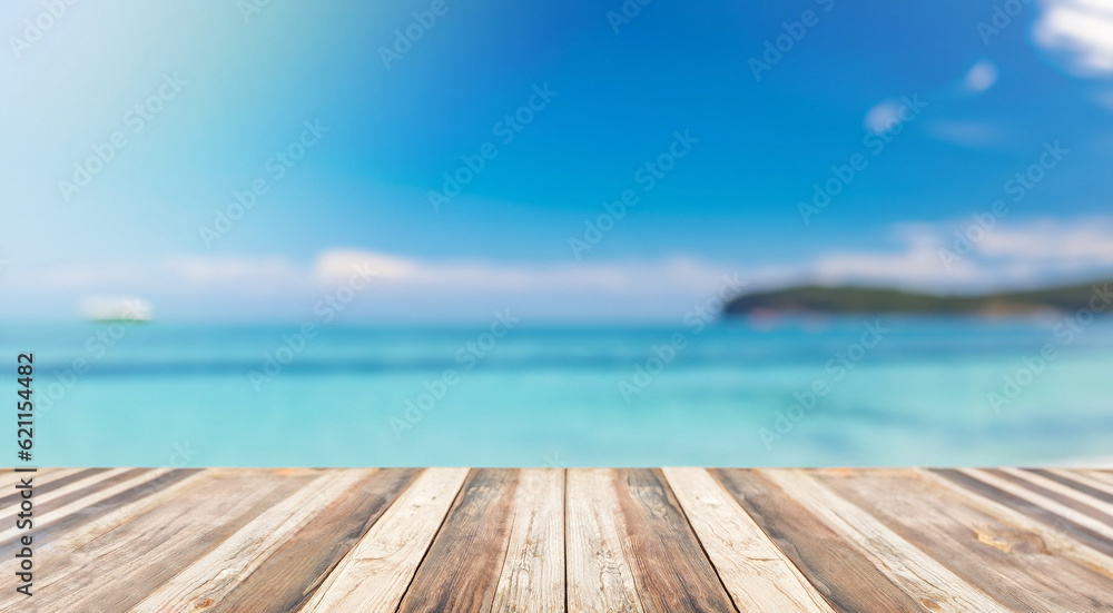 Fototapeta premium Blurred sea background with wood resort deck floor foreground