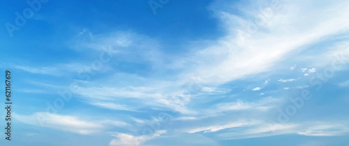 Fototapeta Naklejka Na Ścianę i Meble -  Blue sky clouds background, beautiful landscape with clouds and sky, beautiful blue sky clouds for background. Panorama of sky, white cumulus clouds formation in blue sky.
