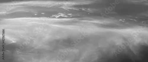 Gllomy sky with dark gray clouds, sky with storm clouds dark, The dark sky with heavy clouds converging and a violent storm before the rain, bad or moody weather sky.