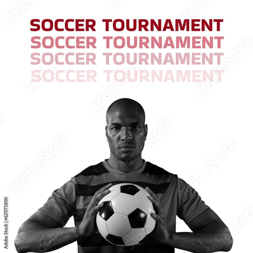 Composition of soccer tournament text over african american male footballer with ball