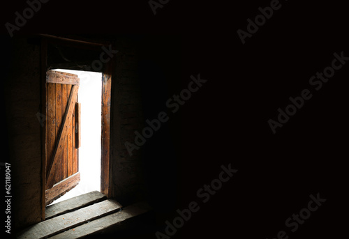 Old open grunge wooden door