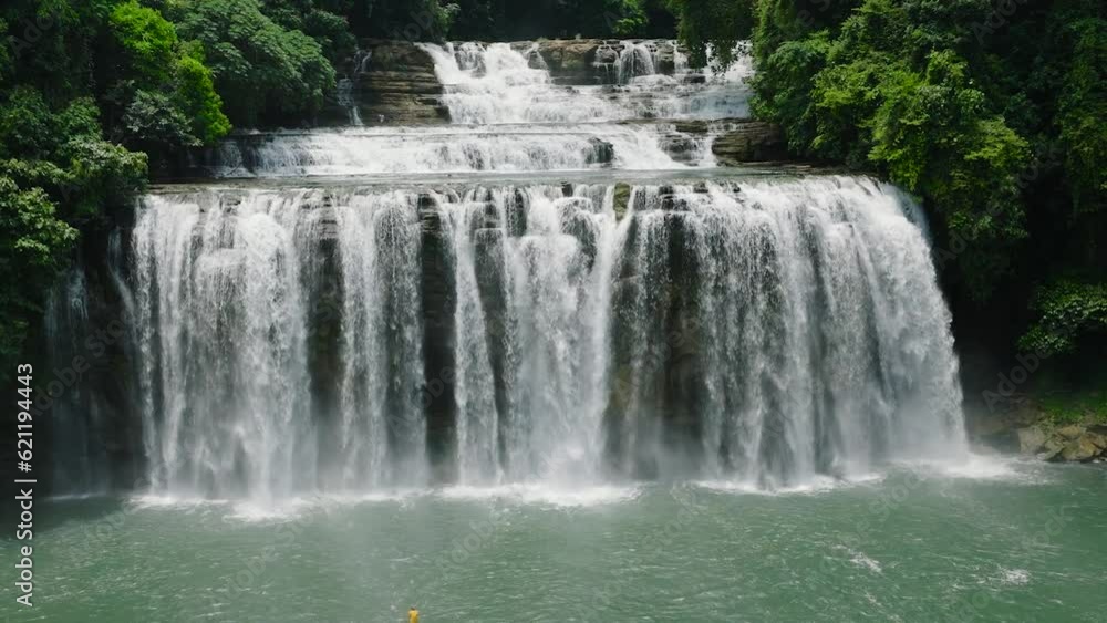 Tropical mountain with waterfalls. Tinuy-an Falls. Bislig, Surigao del Sur. Mindanao, Philippines. Tropical mountain with waterfalls. Tinuy-an Falls. Bislig, Surigao del Sur. Mindanao, Philippines.