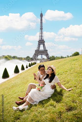 Lovely Asian couple is enjoy traveling at Paris, France.
