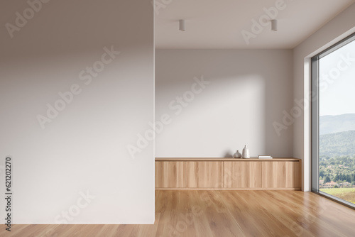 Cozy home living room interior with drawer, decoration and window. Mockup wall