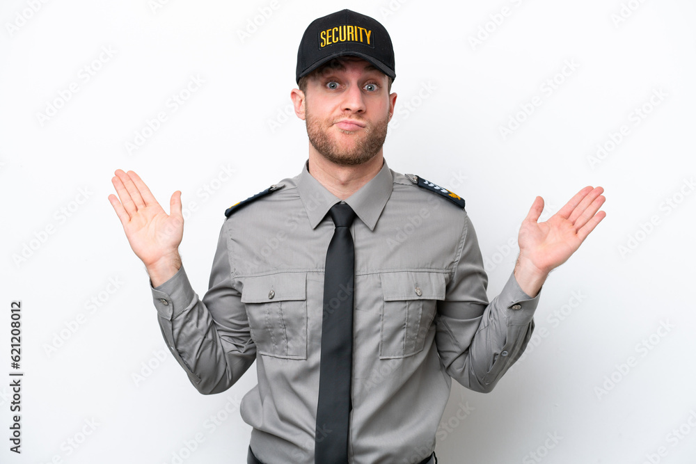 Young safeguard caucasian man isolated on white background having doubts while raising hands Young safeguard caucasian man isolated on white background having doubts while raising hands