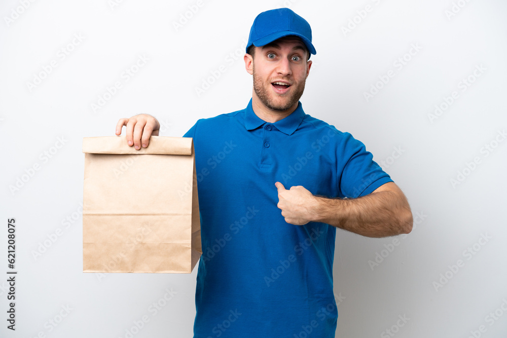 Delivery caucasian man isolated on white background with surprise facial expression Delivery caucasian man isolated on white background with surprise facial expression