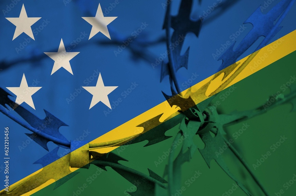 Abstract image of the national flag of Solomon Islands with twisted barbed wire. Abstract image of the national flag of Solomon Islands with twisted barbed wire.