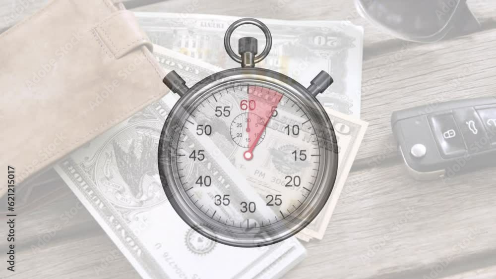 Animation of stop watch ticking over american dollar currency banknotes Animation of stop watch ticking over american dollar currency banknotes