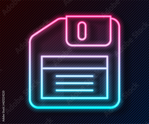 Glowing neon line Floppy disk for computer data storage icon isolated on black background. Diskette sign. Vector