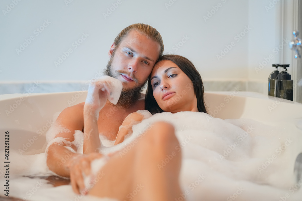 Sexy Young Couple. Young sexy hot couple in love hugging and kissing. Beautiful woman and handsome muscular man close to each other in erotic pose. Sexy Young Couple. Young sexy hot couple in love hugging and kissing. Beautiful woman and handsome muscular man close to each other in erotic pose.
