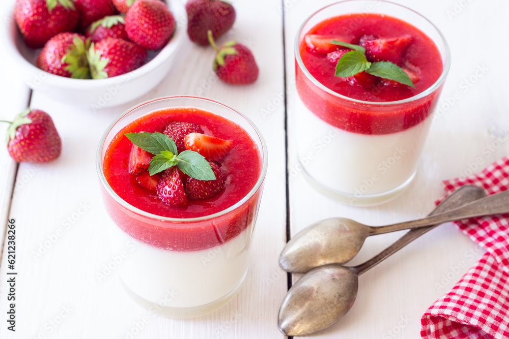 Panna Cotta with strawberries and mint. Dessert. Vegetarian food. Panna Cotta with strawberries and mint. Dessert. Vegetarian food.