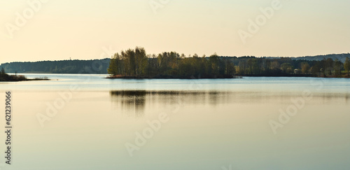 sunrise over the lake with island in middle