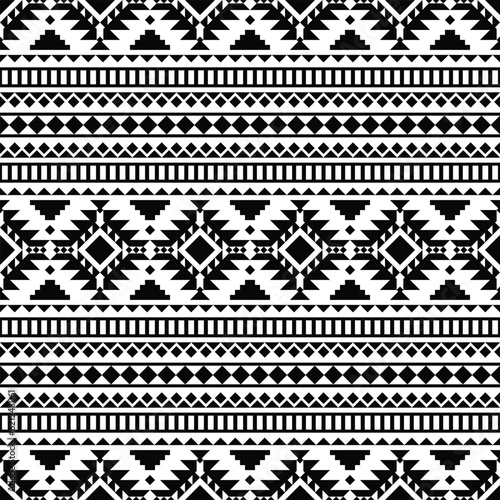 Tribal Navajo geometric abstract background. American indigenous seamless pattern. Ethnic textile. Black and white colors. Design for template, fabric, weave, cover, carpet, tile, accessory.