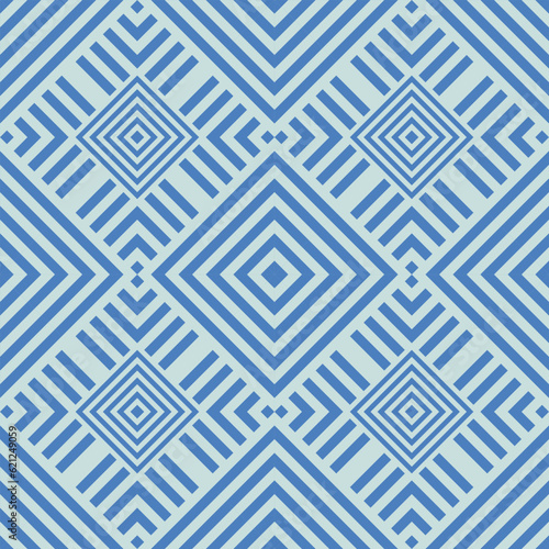 Ethnic geometric patterns: vibrant textiles with zigzag lines and psychedelic shapes.Light blue ethnic interiors: ikat textiles and tartan patterns in a contemporary geometric style