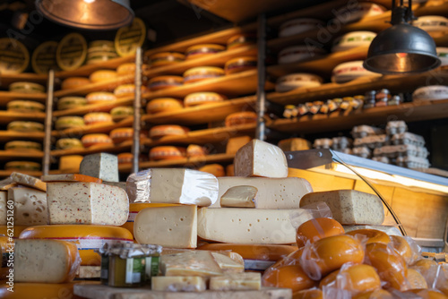 Photography Dutch cheese edam gouda piece and whole round wheel in cheese store