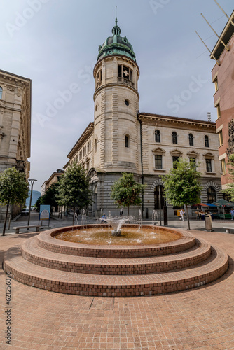 The fountain in the Piazzetta della Posta in the historic center of Lugano, Switzerland
