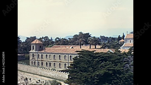 1960s archival view of Abbaye de Lerins is a renowned monastery located on the island of Saint-Honorat, off the coast of Cannes, France in the Cote d'Azur of French Riviera. photo