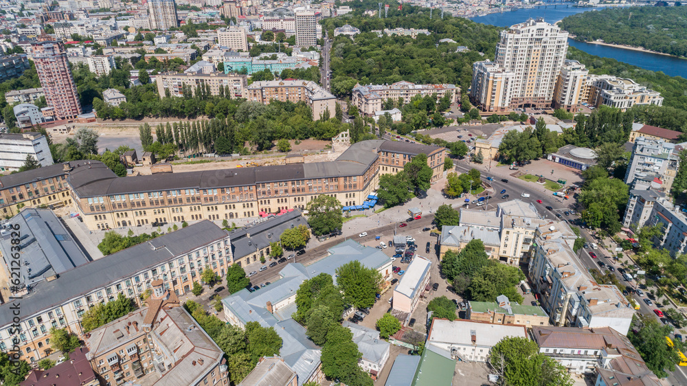 Aerial view building former factory Arsenal. Drone shot beautiful Kyiv Kiev cityscape on a sunny summer day. Capital of Ukraine. Construction