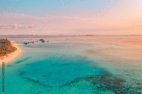 Beautiful panoramic aerial beach. Sunset tropical paradise island. Tranquil summer vacation or holiday landscape. Tropical coast seaside palm calm sea bay panorama exotic nature view inspire seascape