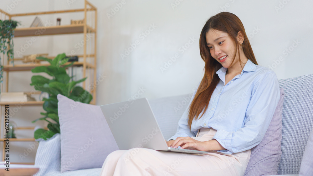 Home office concept, Businesswoman reading data on laptop to analysis marketing plan of startup Home office concept, Businesswoman reading data on laptop to analysis marketing plan of startup